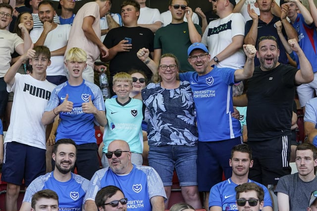 Despite the intense heat at Whaddon Road, there were still plenty of smiles in the away end.