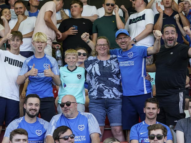 Despite the intense heat at Whaddon Road, there were still plenty of smiles in the away end.