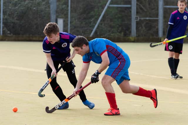 Ryan Rochester (purple) in action during his side's 2-0 win over US Portsmouth 2nds. Picture: Duncan Shepherd