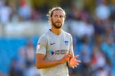 Kenny Jackett has revealed that Christian Burgess has indicated he will assess his options after the season's end. Picture: Nigel Keene/ProSportsImages