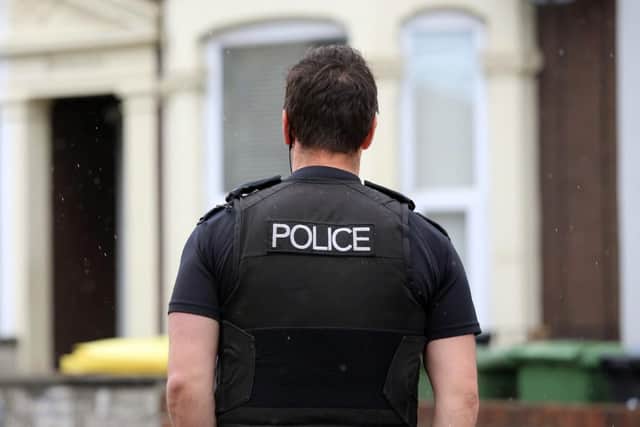 Police are hunting a man who hit a 16-year-old with a bottle