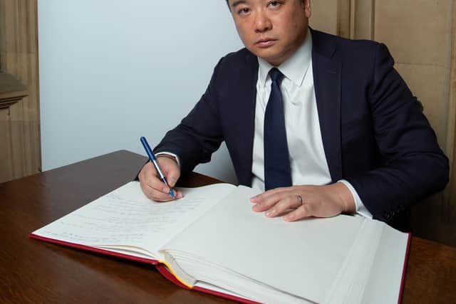 Alan Mak MP signs the Holocaust Educational Trust's Book of Commitment