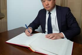 Alan Mak MP signs the Holocaust Educational Trust's Book of Commitment