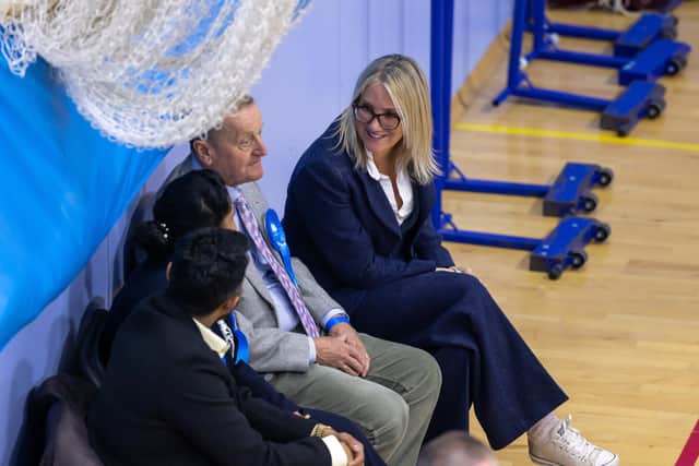 Caroline Dinenage MP chats to candidates as they await results at Gosport Leisure Centre. Picture: Mike Cooter (030524)