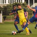 Moneyfields' Dec Seiden (yellow) has joined Portsea Island neighbours Baffins Milton Rovers. Picture: Keith Woodland