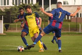 Moneyfields' Dec Seiden (yellow) has joined Portsea Island neighbours Baffins Milton Rovers. Picture: Keith Woodland