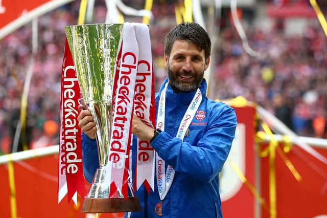 Danny Cowley lifts the EFL Trophy after Lincoln's victory over Shrewsbury in April 2018. Photo by Jordan Mansfield/Getty Images.
