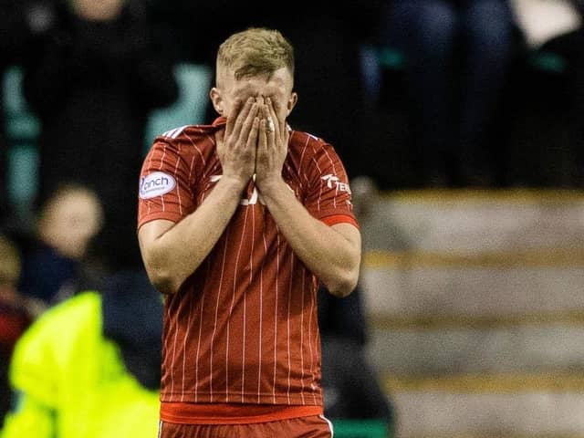 Aberdeen's Ross McCrorie is dejected following a 6-0 defeat at the hands of Hibernian this weekend, costing boss Jim Goodwin his job. Picture: Craig Williamson/SNS Group