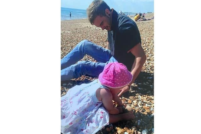 Joe Butland with his daughter Scarlett