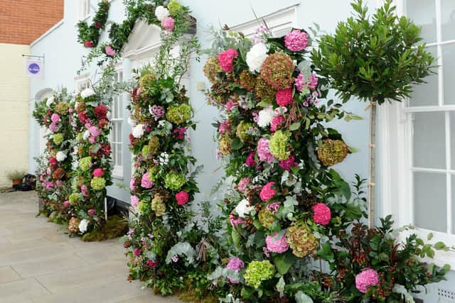 The Breast Cancer Haven, Wessex with a flower wall created by florist Susie Babington 
Picture: Sarah Standing (180726-5308)