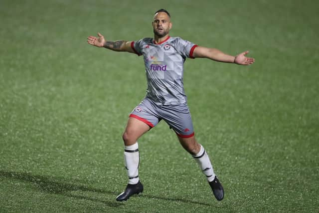 Gosham's Leeroy Grey celebrates his goal. Picture by Dave Haines