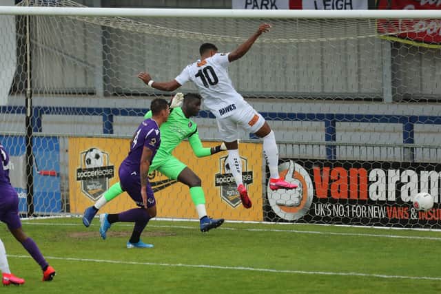 Jonah Ayunga puts Hawks ahead against Dartford. Photo by Dave Haines