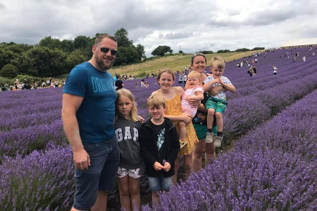 Royal Navy chief petty officer Keith Ross with his wife Sarah and their five children. CPO Ross died in a car crash on the M275 on July 15.