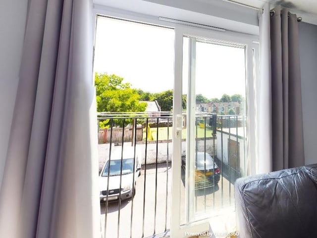 The property overlooks a school playing field and has plenty of light pouring into it.