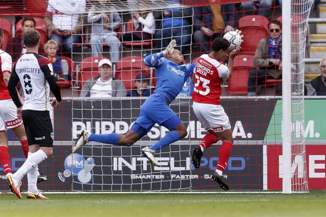 Gavin Bazunu saves from Rarmani Edmonds-Green, however his costly 55th minute mistake changed the match in Rotherham's favour. Picture: Daniel Chesterton/phcimages.com