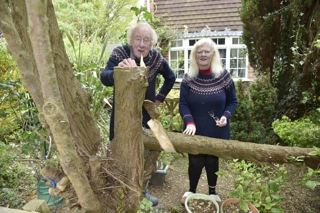 David spent much of the next day clearing the debris from his front garden. Picture: Sarah Standing (270423-2598)