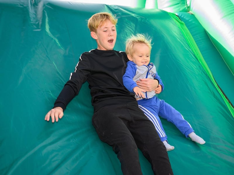 Pictured is: Oscar Goodchild and Fraser Hicks slid down the bouncy castle.Picture: Keith Woodland (300921-8)