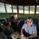 An RAF air traffic controller is supported on the news system by a specialist from Whiteley-based tech firm Aquila Air Traffic Management Syste