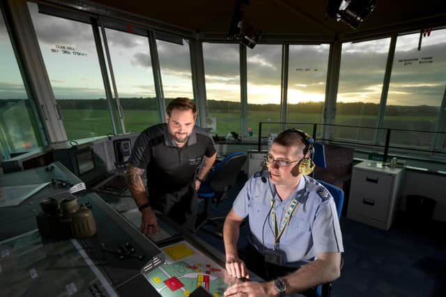An RAF air traffic controller is supported on the news system by a specialist from Whiteley-based tech firm Aquila Air Traffic Management Syste