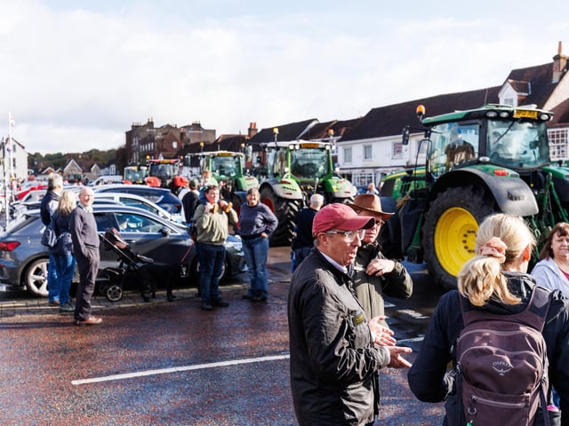 Crowds gathered in Wickham Square to watch the procession of tractors go by all to raise money for Rowans Hospice and Guide Dogs.