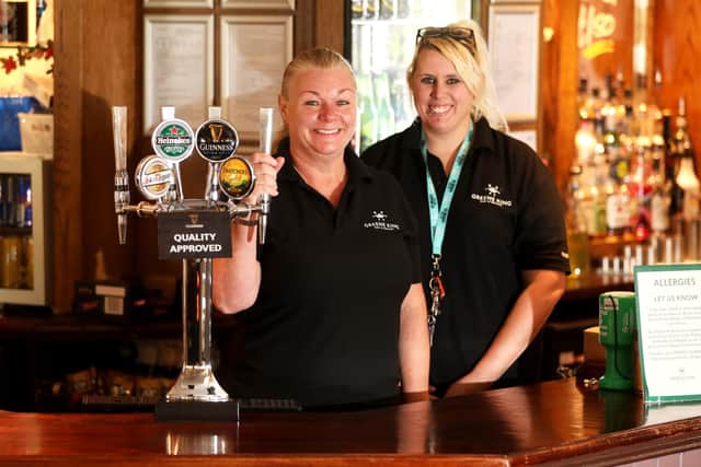 Kate Hopkins, the general manager at the Cuckoo Pint, pictured at the pub in Stubbington, and talking about the pubs reopening, their Christmas plans and recent fundraising activities. Pictured is Kate Hopkins with Cheryn Brown. Picture: Sam Stephenson