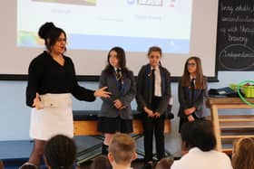 Hajar Bellazrak delivers an assembly to children at Meon Junior School about the benefits of their One:One scheme.