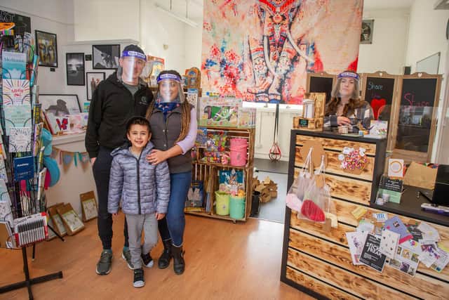 JK Wellness, in Havant Road, Drayton. Joe and Keshia Stewart with their son, Charlie 7 and assistant manager Leah Wallace, 16, inside of their shop in Drayton on 2 March 2021.
Picture: Habibur Rahman