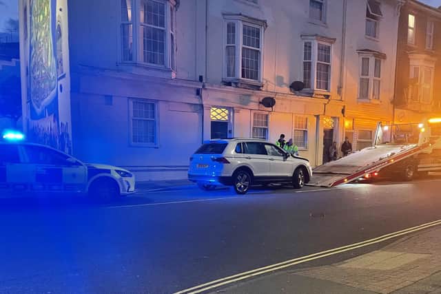 The Volkswagen Tiguan was towed away after police investigated