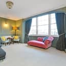This 4 bedroom property comes with two bathrooms and three reception rooms and it spans across three floors.