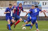 Simon Woods, centre, is available for US Portsmouth after being cup-tied in midweek
