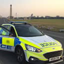 Former inspector Kelvin Shipp with his patrol car on Clarence Esplanade, Southsea, in 2021. He has been given the King's Police Medal in the New Year's Honour List 2023