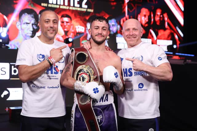 Mikey McKinson, centre, with trainer and father Michael Ballingall, left, and fellow team member Gav Jones. Picture: Mark Robinson/Matchroom Boxing