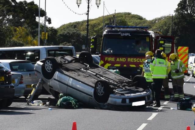 A car has overturned in a crash in South Parade, Southsea, on July 29, 2021. Picture: Stuart Vaizey