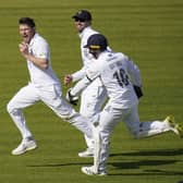 Hampshire's Liam Dawson (left) celebrates after taking the wicket of Somerset's James Hildreth. Picture: Andrew Matthews/PA Wire.