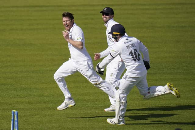 Hampshire's Liam Dawson (left) celebrates after taking the wicket of Somerset's James Hildreth. Picture: Andrew Matthews/PA Wire.