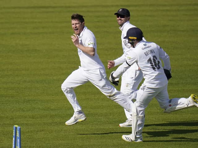 Hampshire's Liam Dawson (left) celebrates after taking the wicket of Somerset's James Hildreth. Picture: Andrew Matthews/PA Wire.