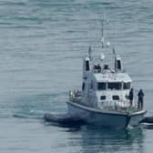 Royal Navy HMS Blazer tows two small boats as it arrives in Dover, Kent on Thursday, following a number of small boat incidents in the Channel. Picture: Gareth Fuller/PA Wire