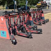 Voi e-scooters at a parking station in Southsea.