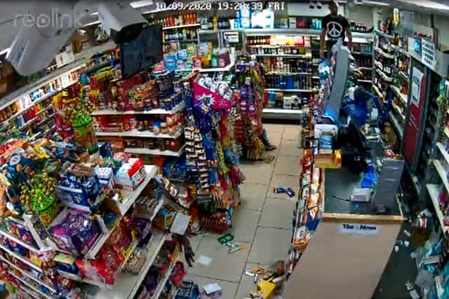 The aftermath of a robbery at the Danny Mart in Ludlow Avenue Paulsgrove on Friday, with shop worker Farcas Daniel on the counter after being chased around the shop. The CCTV footage of the alleged robbery cannot be shown for legal reasons because a man has been arrested. Picture submitted by the shopowner.