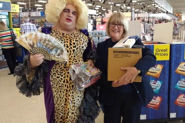 Darren, as Shampagne Shirley, and his friend Liz during one his many previous fundraisers