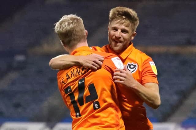Michael Jacobs celebrates his goal against Gillingham with Andy Cannon. Picture: Nigel Keene
