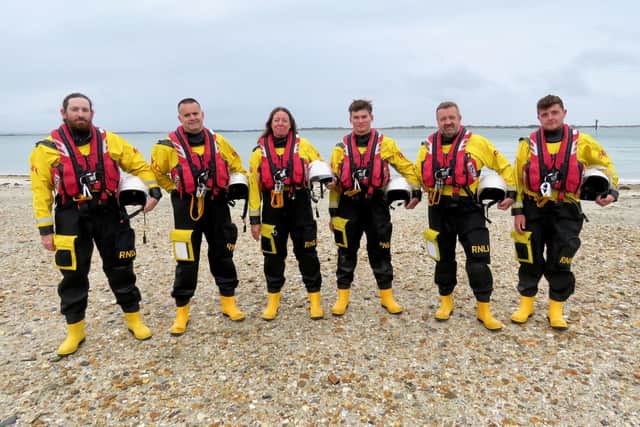 Pictured on the beach at Hayling Island , from left, Thomas Lincoln, Daniel Macpherson, Sharon Swann, Jack Anson, Andrew Ferguson and Lloyd Pepperell Picture: Jonathan Bradbury