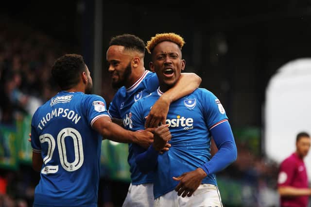 Jamal Lowe celebrates after scoring against Paul Cook's Wigan in Pompey's 2-1 victory in April 2018. Picture: Joe Pepler/Digital South