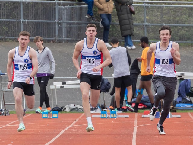 City of Portsmouth AC trio (from left) Dan Smith (155), Sam Foord (163) and  Hayden Van Zeil	(152) in the 100m heats. Picture by Paul Smith
