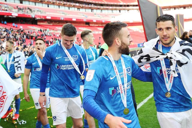 Gareth Evans with Ben Close as the players celebrate after their Checkatrade Trophy final triumph. New Bradford team-mate Alex Bass is obscured behind him. Picture: Joe Pepler