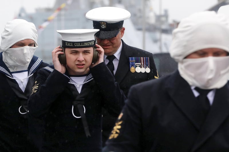 Sailors from HMS Collingwood. Those without the anti-flash gear did not fire the guns.