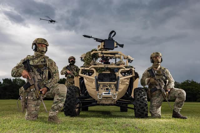 Pictured are Royal Marines of 40 Commando with the Ghost drone during a demonstration for the First Sea Lord and distinguished guests
