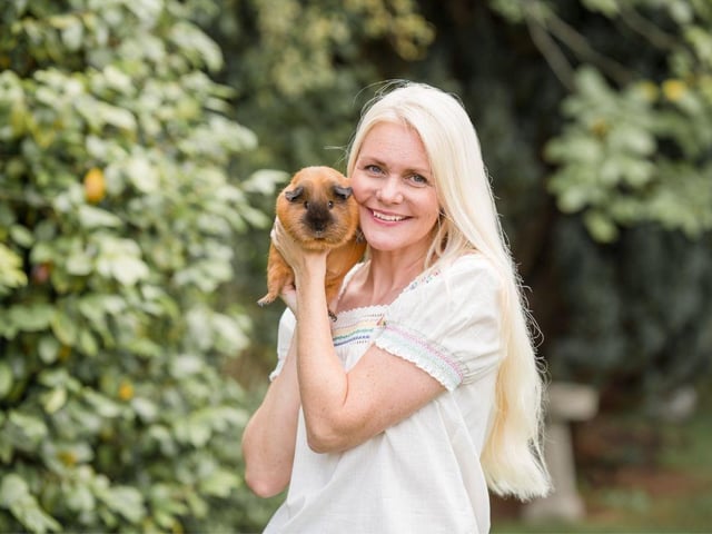 Amanda Beamish and her guinea pig, Sadie. 
Picture credit: Piggie Parcels