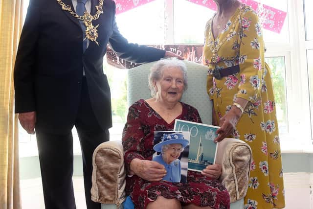 Mary Schoblom celebrated her 100th birthday on Friday, May 27, at St Vincent House Care Home in Southsea.Pictured is: Mary Schoblom with The Lord Mayor of Portsmouth Hugh Mason and Lady Mayoress of Portsmouth Marie Costa.Picture: Sarah Standing (270522-8388)