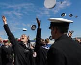 Sailors celebrate passing out at HMS Raleigh